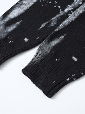 Splatter sweater – Black, cuff close-up | XoKool