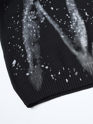 Splatter sweater – Black, hem and splatter close-up | XoKool