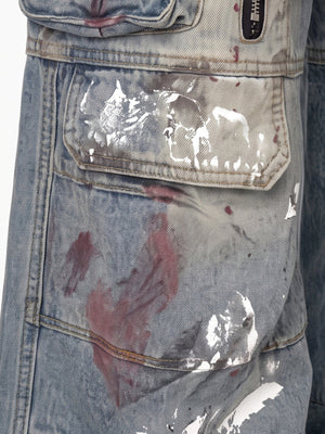 Cargo Jeans mit Farbspritzern – Nahaufnahme der Cargotasche mit Farbe | XoKool