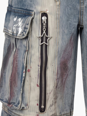 Wide Leg Cargo Jeans mit Farbspritzern und Reißverschlüssen – Nahaufnahme von Reißverschluss mit Stern-Zipper und Cargotasche | XoKool