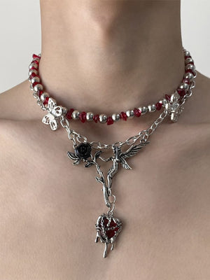 Red Bead Choker with Rose and Butterfly Charms – on model, neck close-up | XoKool