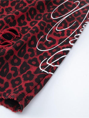 Leopard sweatpants – Distressed hole and script print close-up | XoKool