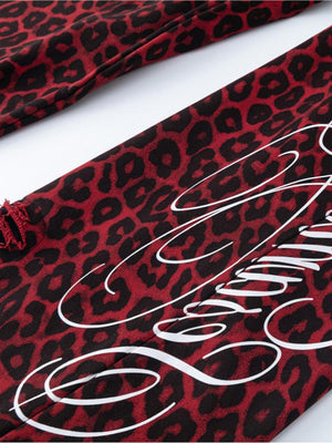 Leopard sweatpants – Script print and frayed hem close-up | XoKool