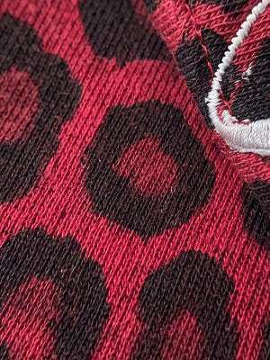 Red Leopard Print Long Sleeve Shirt – fabric close-up with white embroidery | XoKool