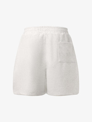 Sweat-Shorts mit gestickten Patches – Hafer, Rückseite flach | XoKool