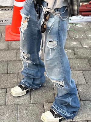 Ripped Light Wash Flare Jeans – street photo, side | XoKool