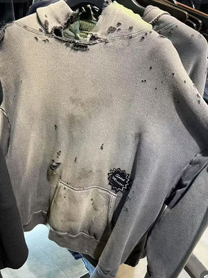 Ripped hoodie – factory photo, front close-up | XoKool