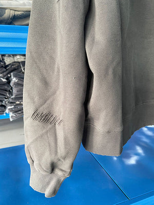 Ripped hoodie – factory photo, sleeve close-up | XoKool
