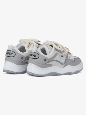 Letter patch skate shoes – Grey pair, back three-quarter | XoKool