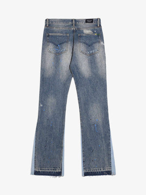 Jeans acampanados (flare) con salpicaduras de pintura e insertos en contraste – vista trasera plana | XoKool