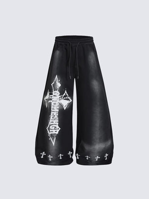 Y2K Jogginghose mit Gothic-Kreuz und Spray-Fade – Schwarz, Vorderansicht flach | XoKool
