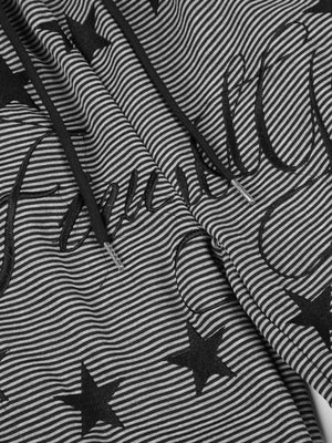Striped cargo sweatpants – Script and star print close-up | XoKool
