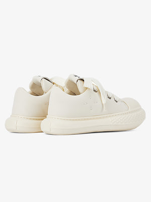 Zapatillas chunky big toe – Par crema, vista trasera en ángulo | XoKool