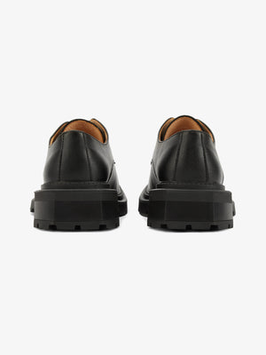 Chunky Derby Schuhe – schwarze Sohle, Paar von hinten | XoKool