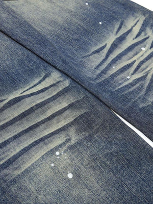 Vintage Wash Wide Leg Jeans with Paint Splatter – whiskers and paint flecks close-up | XoKool