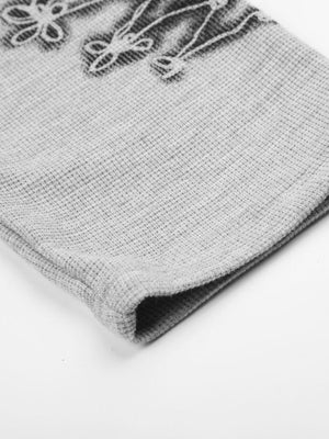 Waffelstrick-Longsleeve – Detail des Print am Bündchen | XoKool