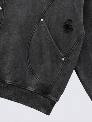 Washed Black Distressed Pullover Hoodie – curved pocket rivet and hole detail | XoKool