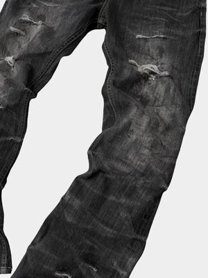 Washed black jeans – leg distressing close-up | XoKool