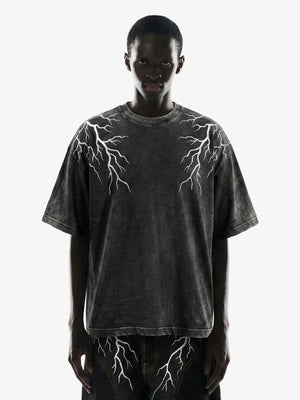 Washed Black Oversized Tee with Lightning Bolt Design – on model, front | XoKool