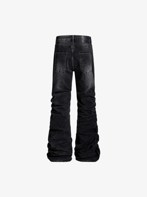 Washed Black Flared Jeans im Stacked-Look mit Knopfleiste – Rückseite flach | XoKool