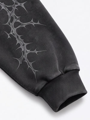 Dornen-Hoodie – Nahaufnahme von Ärmel-Print und Bündchen | XoKool