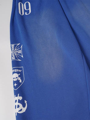 Jogginghose mit Print – Blau, seitliche Prints im Detail | XoKool