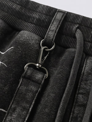 Shorts deportivos con correas – detalle de la cintura y el cierre de la correa | XoKool