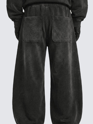 Pantalones deportivos balloon gris oscuro con efecto lavado y cremallera en el bajo – en modelo, espalda | XoKool