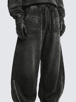 Pantalones deportivos balloon gris oscuro con efecto lavado y cremallera en el bajo – en modelo, frente | XoKool