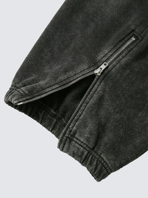 Pantalones deportivos con cremallera en el bajo – primer plano de la cremallera del bajo | XoKool