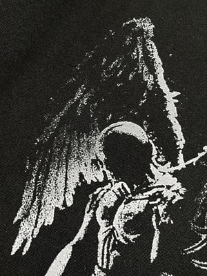 Winged skeleton layered tee – graphic detail close-up | XoKool