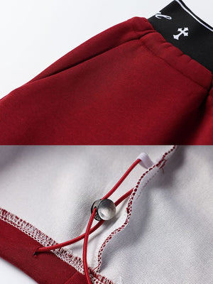 Jogginghose mit Schriftzug-Print – Nahaufnahme Bund und Saumzug | XoKool