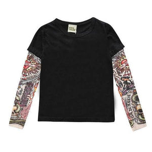 It’s not every day you see a toddler or kid sporting some awesome tats. Dress your cool kid in this shirt and it will be sure to turn heads! It comes with printed tattoos on each sleeve 👦 ☑️ This incredibly unique, unisex outfit is perfect for any occasi