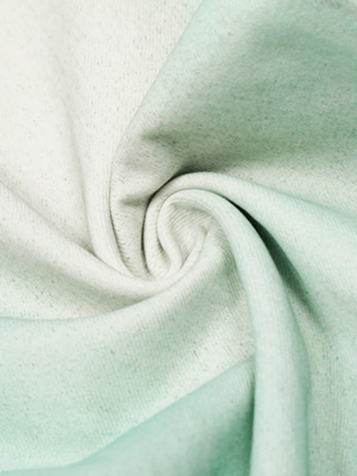 Mint green jeans – fabric swirl close-up | XoKool