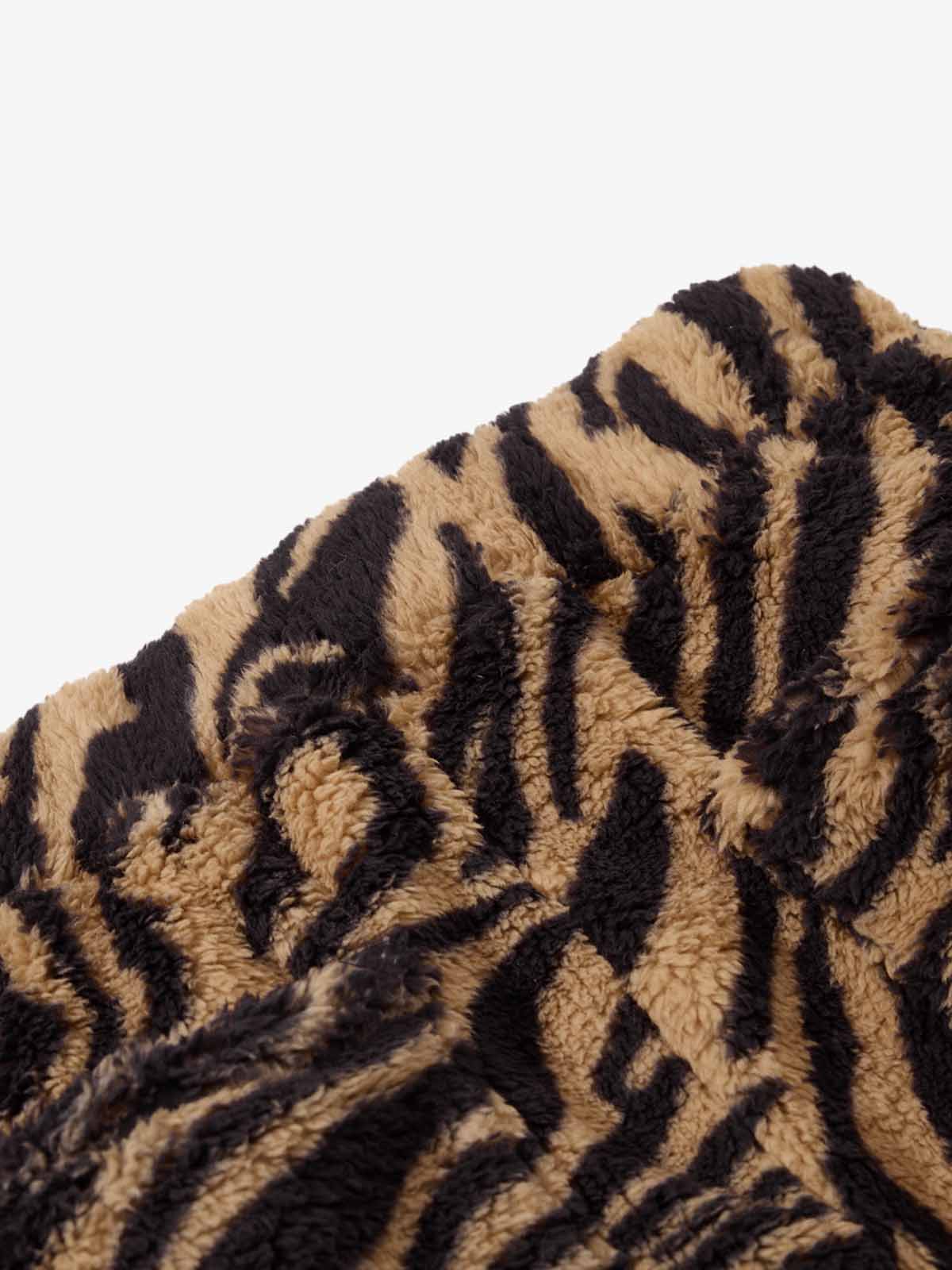 Zebra print pants – sherpa waistband close-up | XoKool