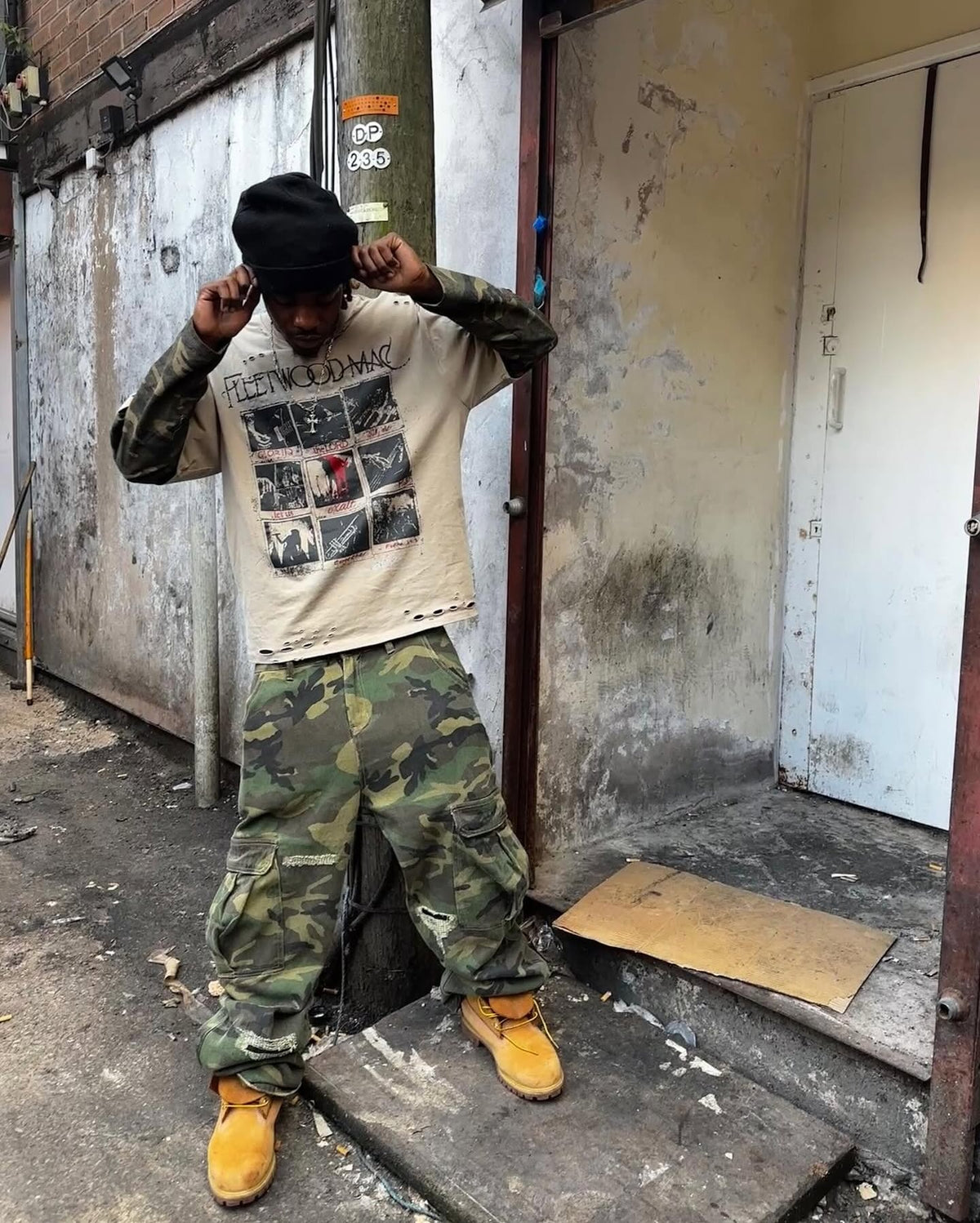 Camo Sleeve Layered Long Sleeve Graphic Tee – On model, street photo | XoKool