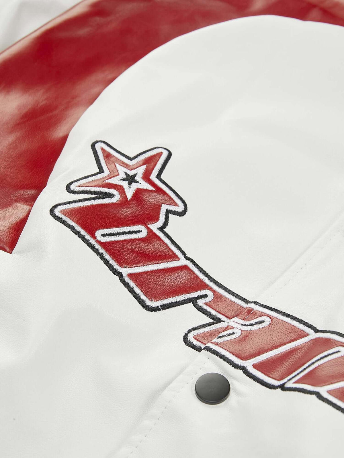 Colorblock Faux Leather Racing Jacket – Star applique close-up | XoKool