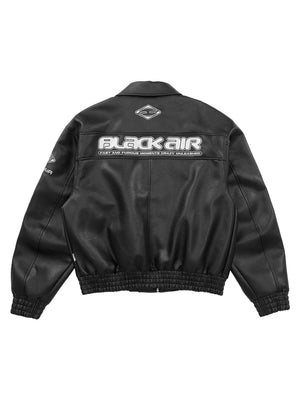 Make a bold statement with the American Vintage Street PU Leather Jacket. Crafted from lightweight satin with a sleek PU leather finish, this standout piece features a reflective logo and star print details for a unique urban edge. The jacket includes rib