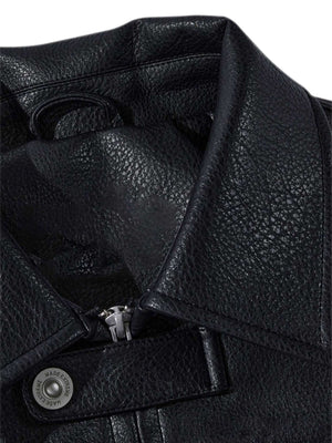 Make a bold statement with the American Vintage Street PU Leather Jacket. Crafted from lightweight satin with a sleek PU leather finish, this standout piece features a reflective logo and star print details for a unique urban edge. The jacket includes rib