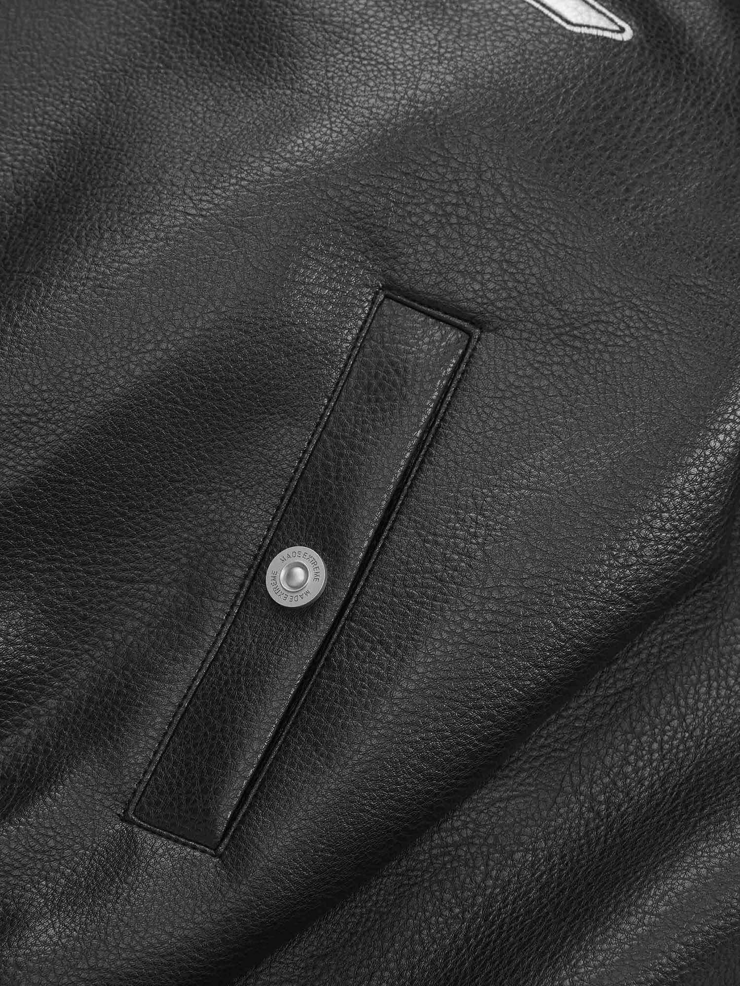 Make a bold statement with the American Vintage Street PU Leather Jacket. Crafted from lightweight satin with a sleek PU leather finish, this standout piece features a reflective logo and star print details for a unique urban edge. The jacket includes rib