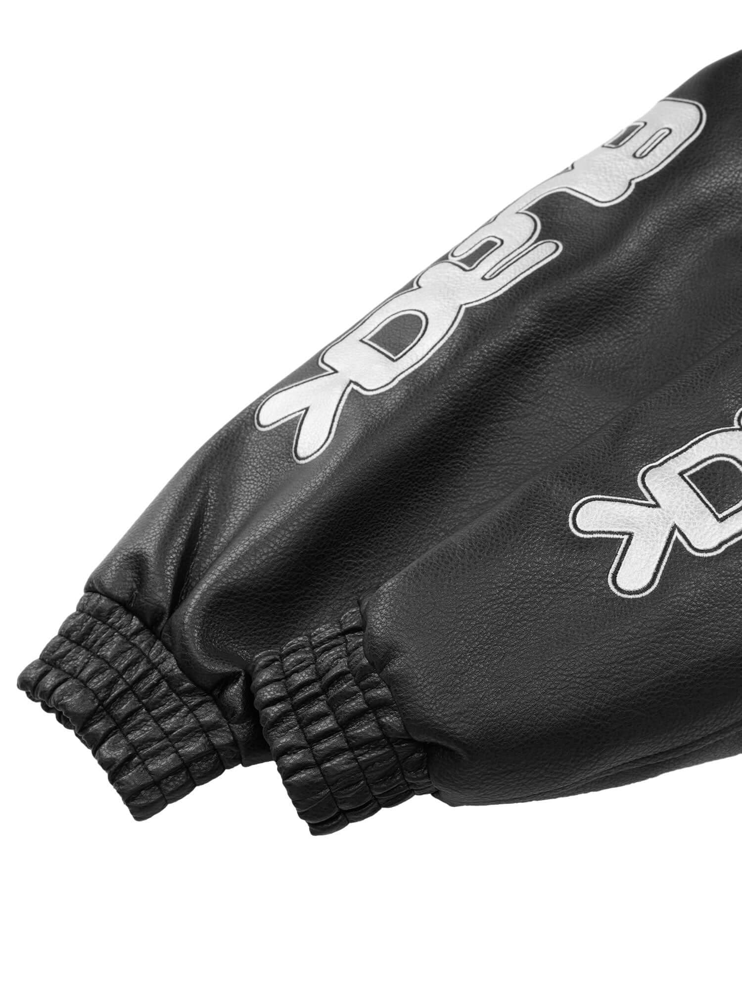 Make a bold statement with the American Vintage Street PU Leather Jacket. Crafted from lightweight satin with a sleek PU leather finish, this standout piece features a reflective logo and star print details for a unique urban edge. The jacket includes rib