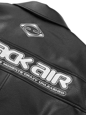 Make a bold statement with the American Vintage Street PU Leather Jacket. Crafted from lightweight satin with a sleek PU leather finish, this standout piece features a reflective logo and star print details for a unique urban edge. The jacket includes rib