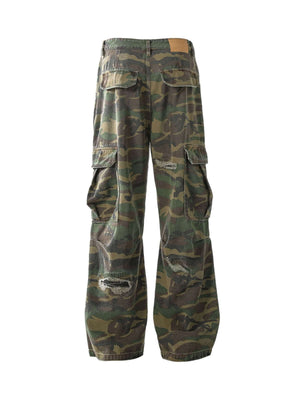 Stay ready for anything with the Camouflage Utility Cargo Pants. Made from a durable and breathable cotton blend, these pants feature a versatile camouflage print that adds bold style to any streetwear or outdoor look. With multiple spacious pockets and a