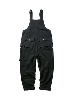 Redefine casual comfort with the Cargo Overall Pants — a stylish and functional piece that brings workwear edge to everyday outfits. Made from sturdy denim, these overalls feature adjustable shoulder straps, a button closure, and multiple front pockets fo