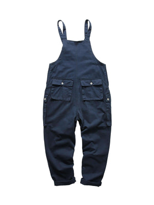 Redefine casual comfort with the Cargo Overall Pants — a stylish and functional piece that brings workwear edge to everyday outfits. Made from sturdy denim, these overalls feature adjustable shoulder straps, a button closure, and multiple front pockets fo