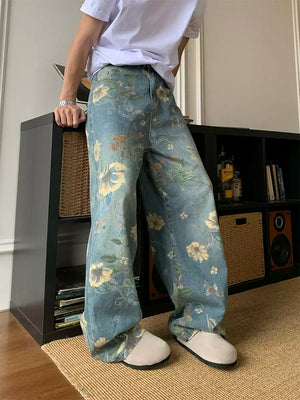 Bring retro vibes to your wardrobe with the Carpenter Pant. Crafted from durable denim, these high-waist, wide-leg pants feature a unique vintage floral print for a standout casual look. The elastic waistband ensures a secure and comfortable fit, while th