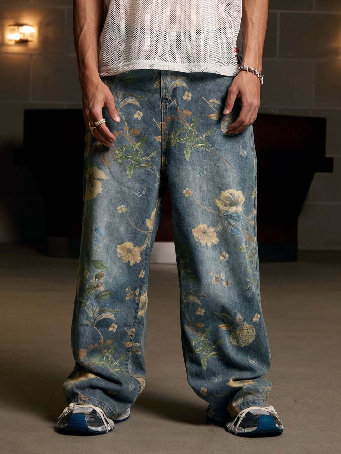 Bring retro vibes to your wardrobe with the Carpenter Pant. Crafted from durable denim, these high-waist, wide-leg pants feature a unique vintage floral print for a standout casual look. The elastic waistband ensures a secure and comfortable fit, while th