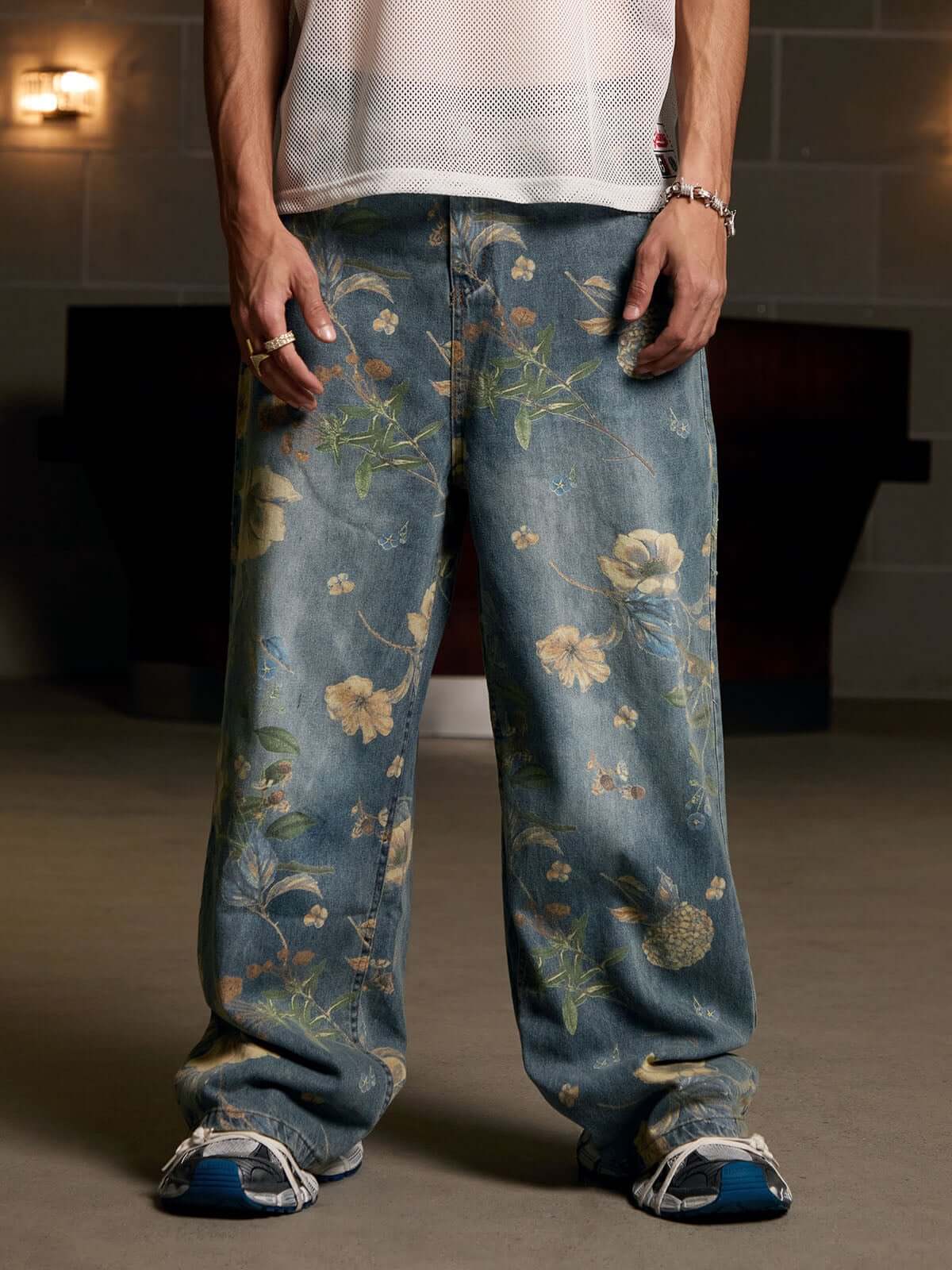 Bring retro vibes to your wardrobe with the Carpenter Pant. Crafted from durable denim, these high-waist, wide-leg pants feature a unique vintage floral print for a standout casual look. The elastic waistband ensures a secure and comfortable fit, while th