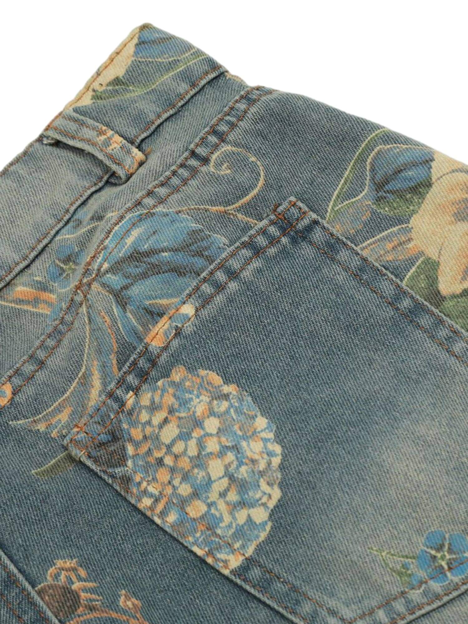 Bring retro vibes to your wardrobe with the Carpenter Pant. Crafted from durable denim, these high-waist, wide-leg pants feature a unique vintage floral print for a standout casual look. The elastic waistband ensures a secure and comfortable fit, while th