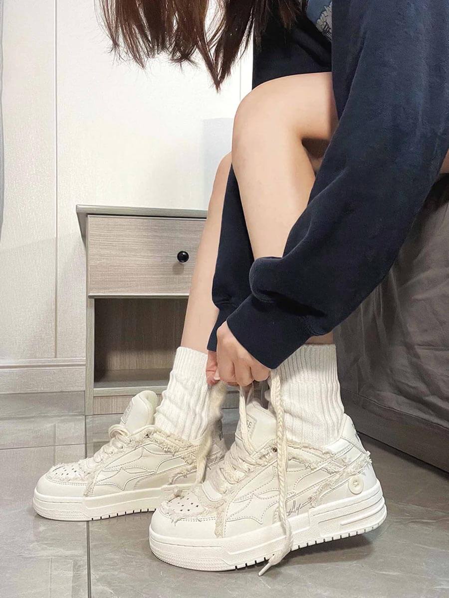 Step into everyday style with the Casual White Board Shoes — a clean and modern essential for casual and streetwear looks. Crafted from premium leather, these low-top sneakers feature a perforated design for breathability, a chunky sole for height and sup